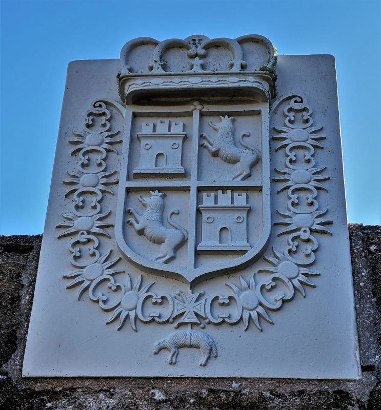 New carving of the Spanish coat of arms.