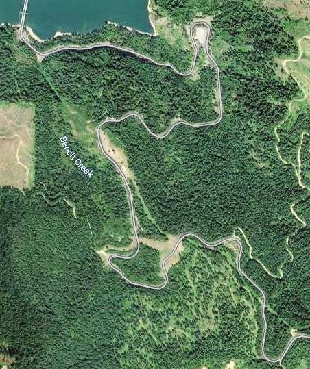 Satellite view of the Dent Bridge Road. The end of the bridge is in the upper left. Every curve marks the location of a steep spot. In fact, in this picture, the entire road is steep. This road is the reason we are not going back. 