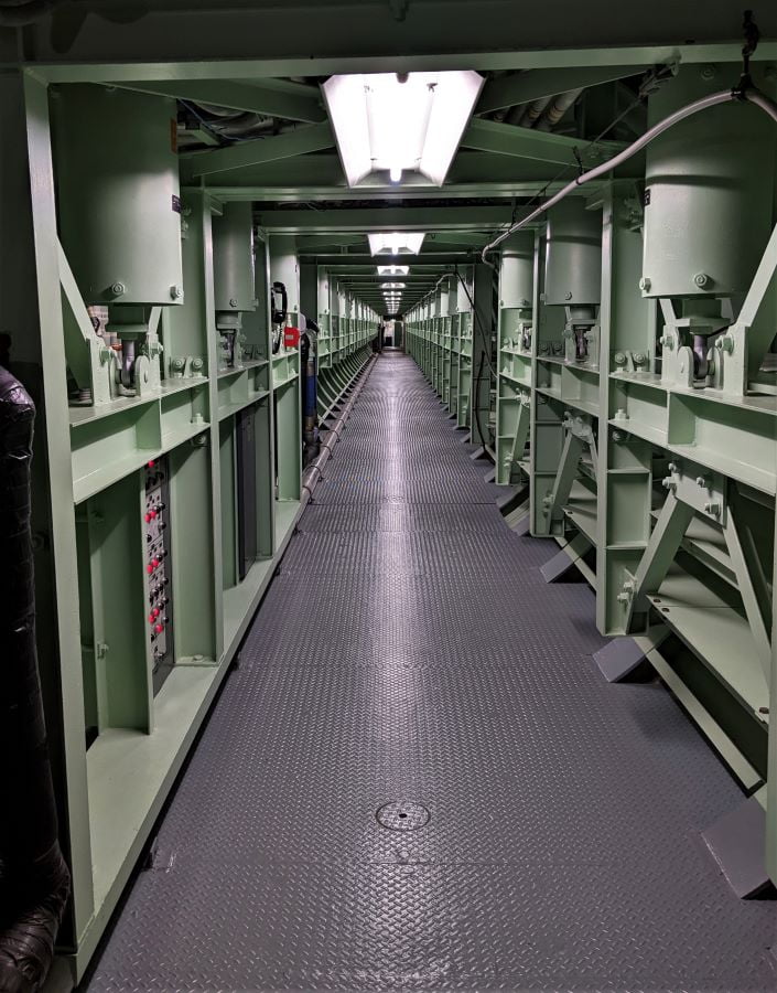 Between the access ladder and the missile silo, ths long corridor and blast doors shielded the launch crew from the missile silo.