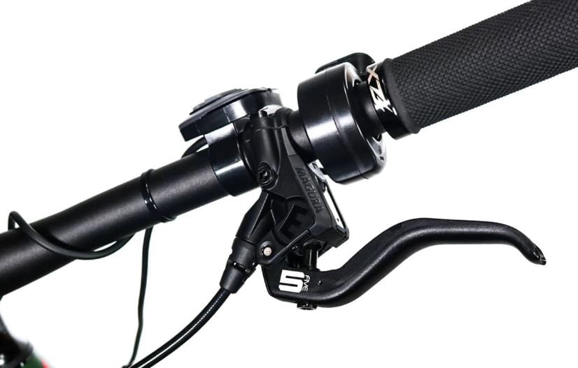 Hydraulic brake levers and thumb throttle.