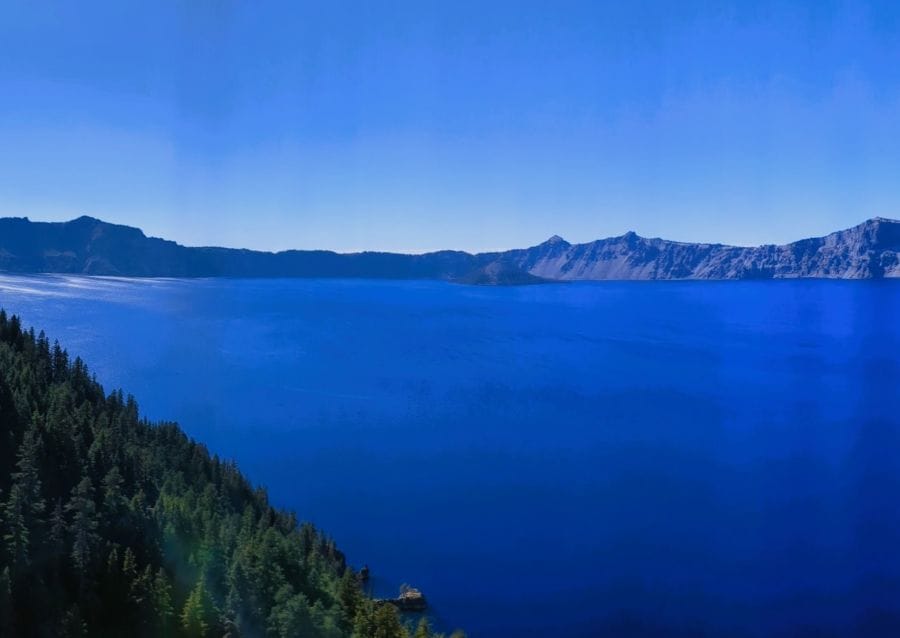 Wizard Island is at the far side of this photo of Crater Lake. This means that we are on the east side of the lake looking towards the west.