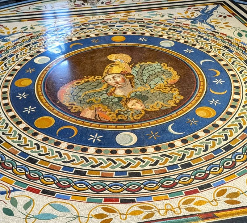 Splendid frescos in the Vatican Museum 13 Mosaic on the floor in the Vatican Museums with a central medallion featuring Athena, surrounded by phases of the moon.  Photo from FoxRVTravel article Splendid frescos in the Vatican Museum
