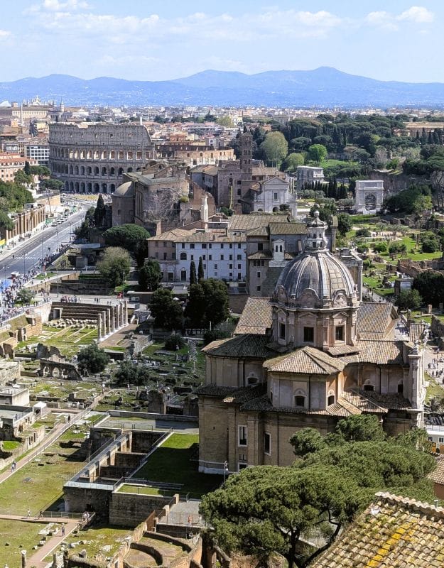 Monument of Victor Emmanuel II di Savoia in Rome 14 This view to the east from the top of the Monument of Victor Emmanuel II includes the Colosseum, Roman Forum, and the Church of Saints Luca. Photo from FoxRVTravel Monument of Victor Emmanuel II.