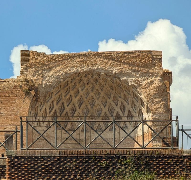 This is the inside of the dome of the Temple of Venus in Rome. Under this arch stood the statue of Venus. The dome stands on four story tall walls and was erected by Hadrian in 121 A.D. It is the largest sacred building built by the Romans. While being built he had to remove the 60 foot tall statue of Nero called the Colossus. Photos are from the FoxRVTravel article “The Roman Forum.”