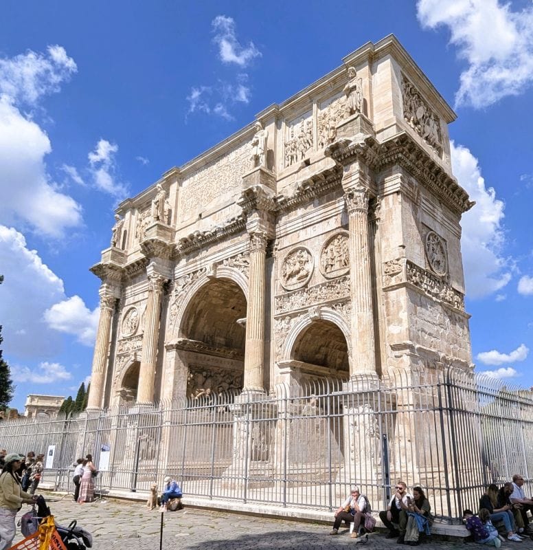 Arch of Constantine is at the east end of the Forum near the Colosseum. This is the celebration gate that starts the Via Sacra which was the main street through the Forum. This arch was created to honor Constantine to remember the victory of Constantine at the Battle of Milvian Bridge. in 312 A.D. Photos are from the FoxRVTravel article “The Roman Forum.”