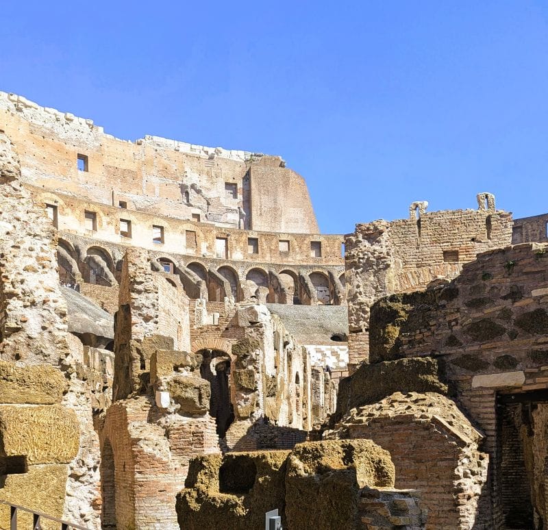 In this photo we are sanding at ground level in the Colosseum. Since the Colosseum was built on previous ruins, if you dig below this level you will find more artifacts that possibly pre-date the Roman era. Photos are from FoxRVTravel article "The Roman Colosseum."