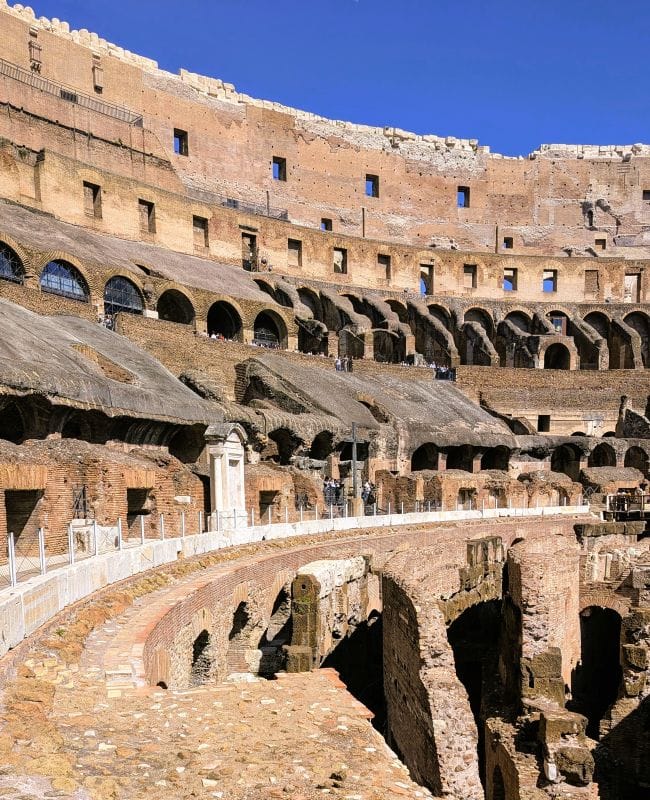 Looking around the remain structure of the Colosseum at the level of the arena. Above the seating they put shade sails to protect the spectators from the sun. Photos are from FoxRVTravel article "The Roman Colosseum"