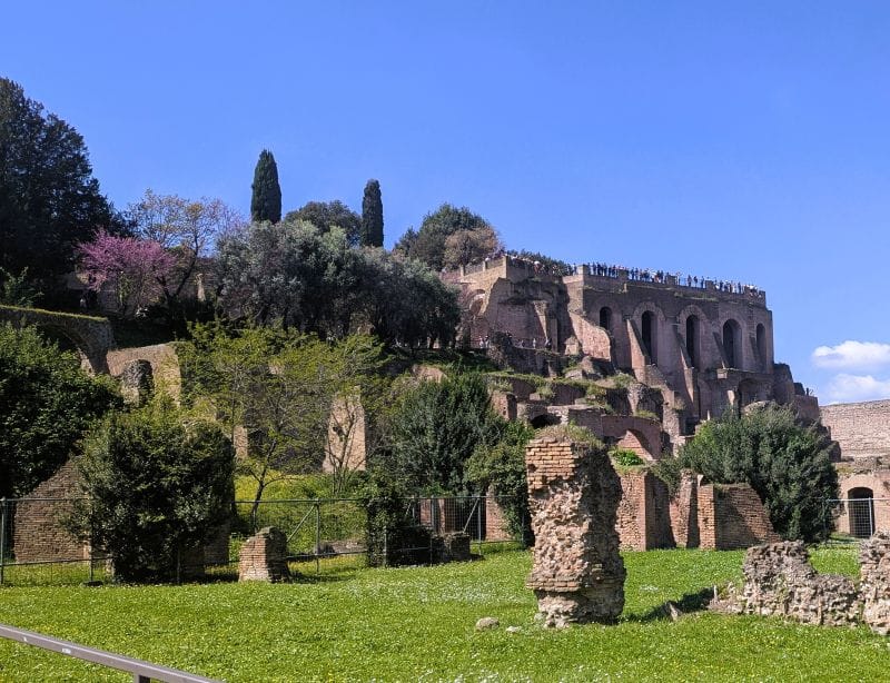 The Palatine Hill as seen from the forum. The Palatine Hill is to the south of the forum and the Capitoline Hill is to the west of the forum. Photos are from the FoxRVTravel article “The Roman Forum.”