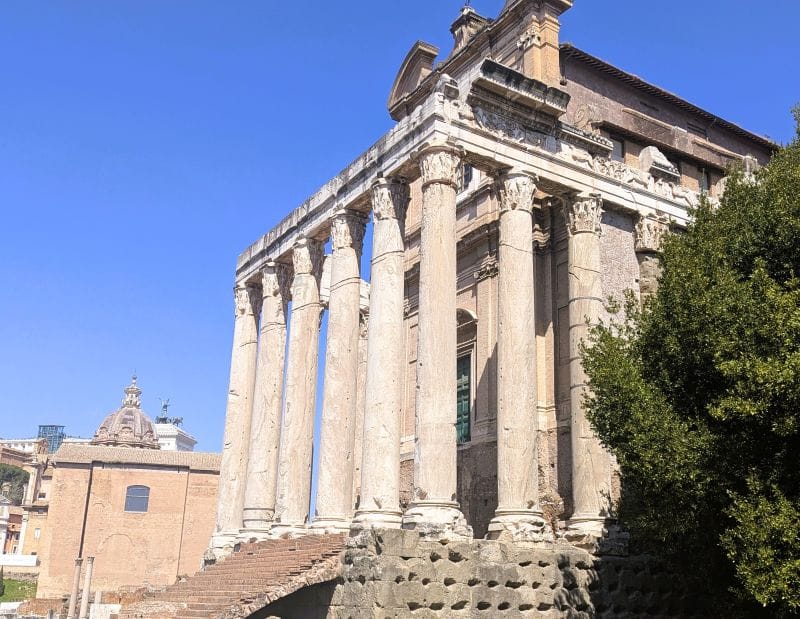 The Temple of Antoninus and Faustina deep grooves in the temple's columns are supposed to date to a medieval attempt to dismantle the pillared portico to destroy the pagan temple. Photos are from the FoxRVTravel article “The Roman Forum.”