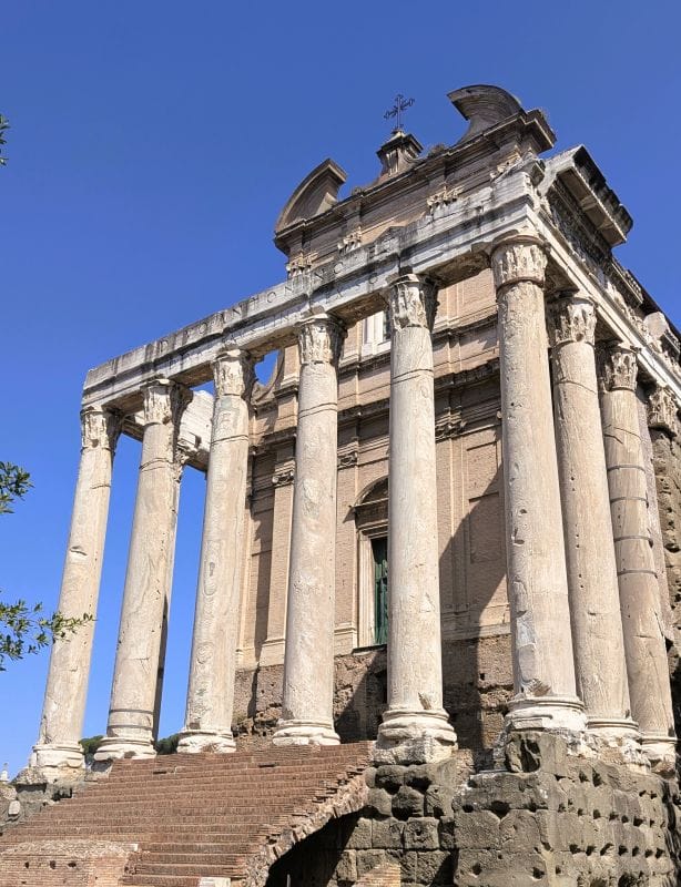 The Temple of Antoninus and Faustina was originally fenced off from the Via Sacra and a large, seated statue of Faustina. Photos are from the FoxRVTravel article “The Roman Forum.”