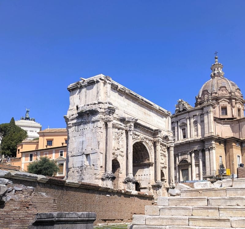 Arch of Septimius Severus and to the right is the dome on the Church of Saints Luca and Martina. Photos are from the FoxRVTravel article “The Roman Forum.”