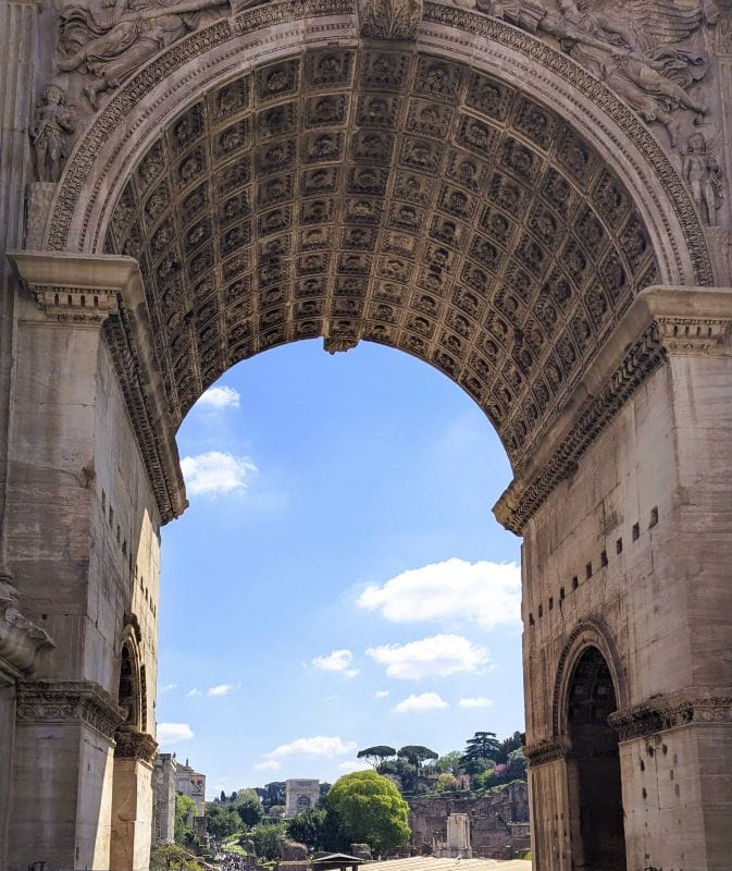 Arch of Septimius Severus is near the west end of the Forum was dedicated in 203 A.D. It was erected to celebrate the victories of the Romans over the Parthian Empire located in present day Iraq and Iran. Photos are from the FoxRVTravel article “The Roman Forum.”