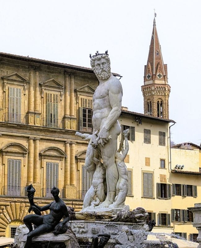 Visiting Florence is an art lesson on the streets 18 The Fountain of Neptune in Florence Palazzo Vecchio, behind the fountain is a sign forbidding us from doing our laundry in the fountain. Photo from FoxRVTravel article "Visiting Florence is a art lesson on the streets"
