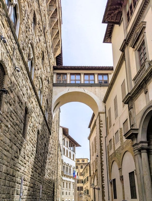 Visiting Florence is an art lesson on the streets 10 A private bridge above the streets used by the Medici leading to the Ponte Vecchio bridge. Photo from FoxRVTravel article "Visiting Florence is a art lesson on the streets"