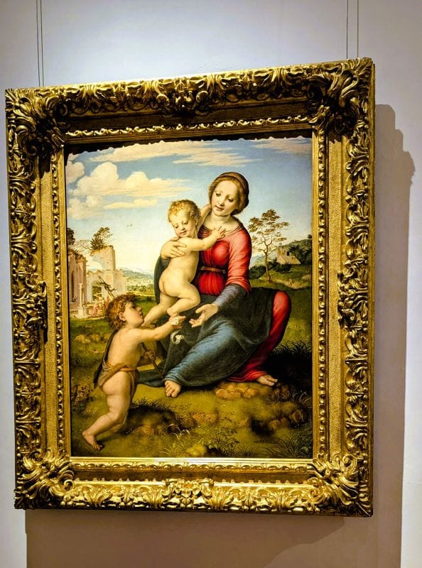 Jacopo Torni (1476–1526), also known as Jacobo Fiorentin, L'Indaco, and Jacopo dell'Indaco, Madonna and Child with the Young Saint John (Madonna of the Well) c. 1513 oil on panel Photo from FoxRVTravel article "Masterpiece paintings at the Uffizi Gallery" 