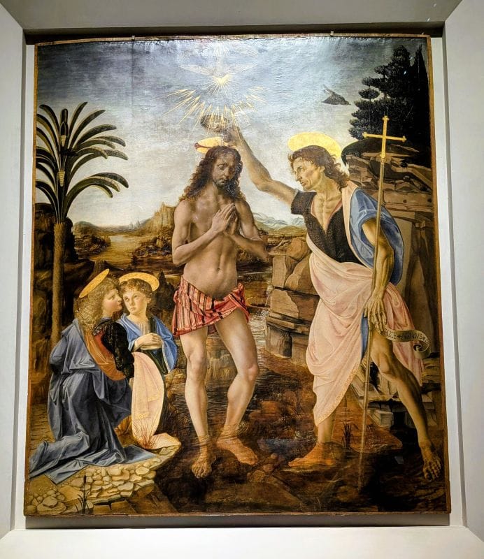 Leonardo di Vinci The Baptism of Christ C. 1475 tempera and oil on wood Photo from FoxRVTravel article "Masterpiece paintings at the Uffizi Gallery" 