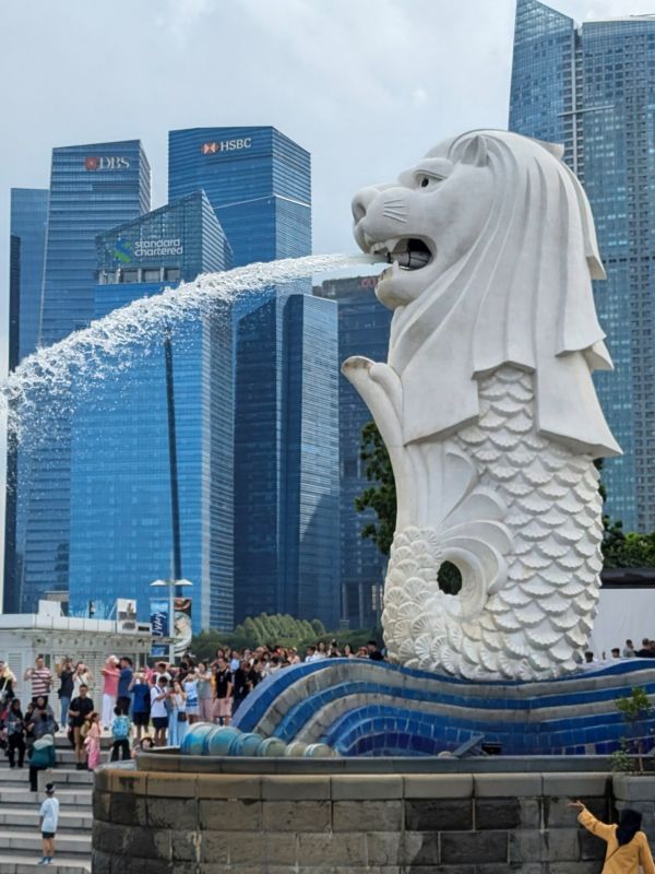 This statue is a combination of a Mermaid and Lion called the Merlion and is the symbol of Singapore.