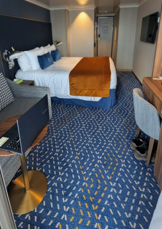 I took this photo while standing on our balcony so I could get a shot of the entire room. The living space in our RV is more than twice this size.