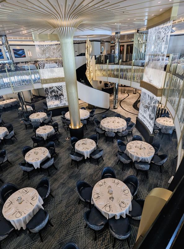 Queen Anne's main dining room is two levels with a circular staircase. Most of the time, the tables are set, but sometimes, some of them are used for arts and crafts for short periods. 