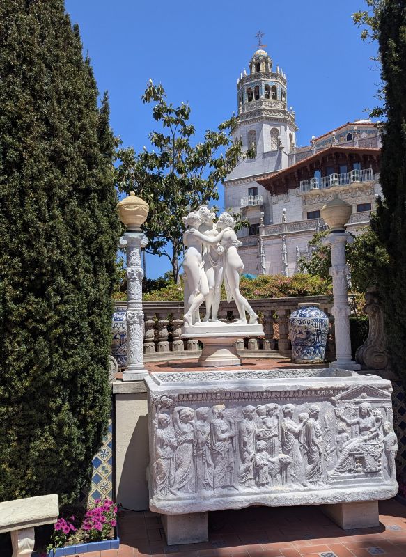 This box is an antique casket that Hearst obtained from Europe. My guess is that it is about 1800 year old, or perhaps it is a reproduction. Above it is the Hearst Castle main house.