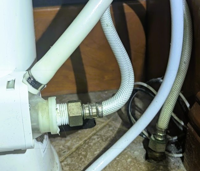 Photo of hoses behind my toilet