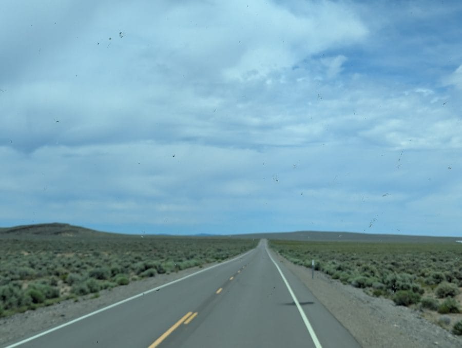 Crossing eastern Oregon in 2026 before the summer heat. 12 This photo is the straight road across Christmas Valley in eastern Oregon.