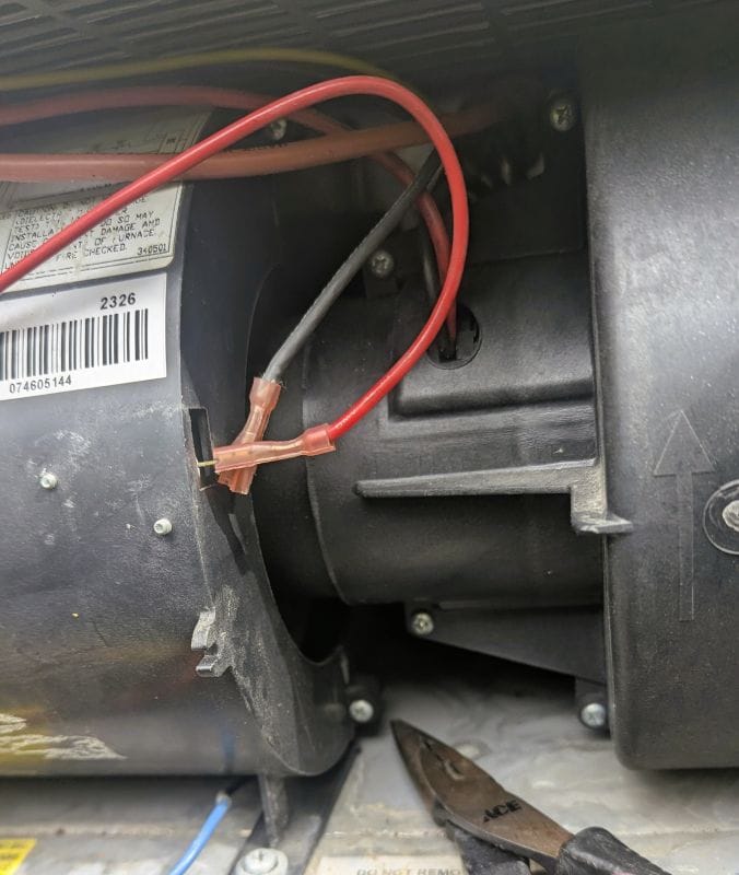 Winter started at the end of June. 11 These two wires had to be removed from the sail switch before I could remove the shroud around the blower fan and get near the problem.