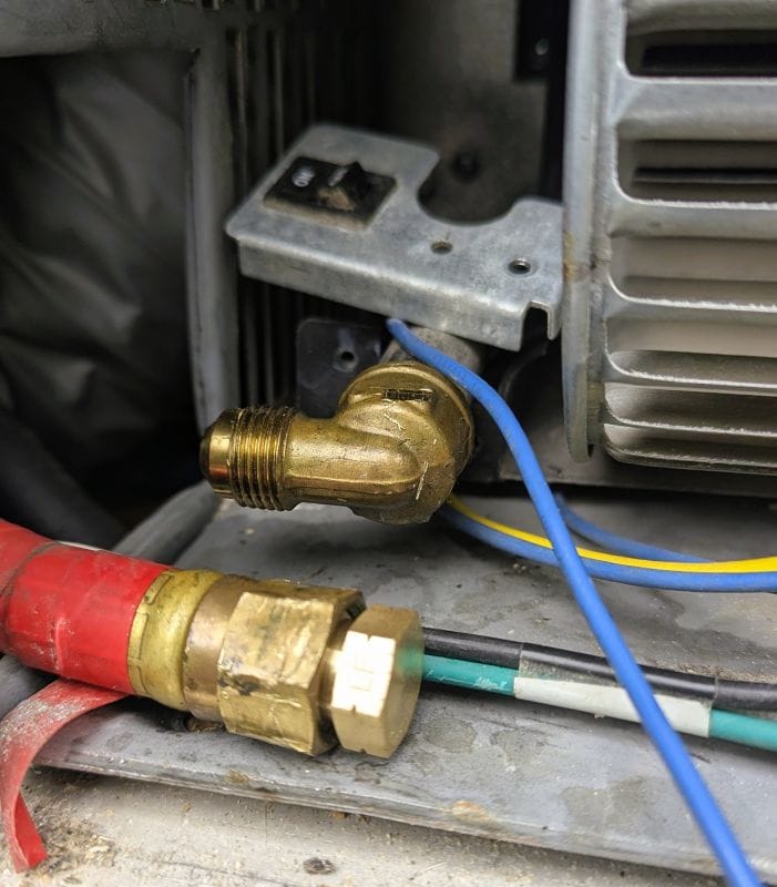Winter started at the end of June. 10 Before I started work I had to go buy a brass plug for the propane line running to the furnace. You can't remove the furnace without breaking this connection and I wanted the rest of my propane system intact if this was going to be a multi-day repair.