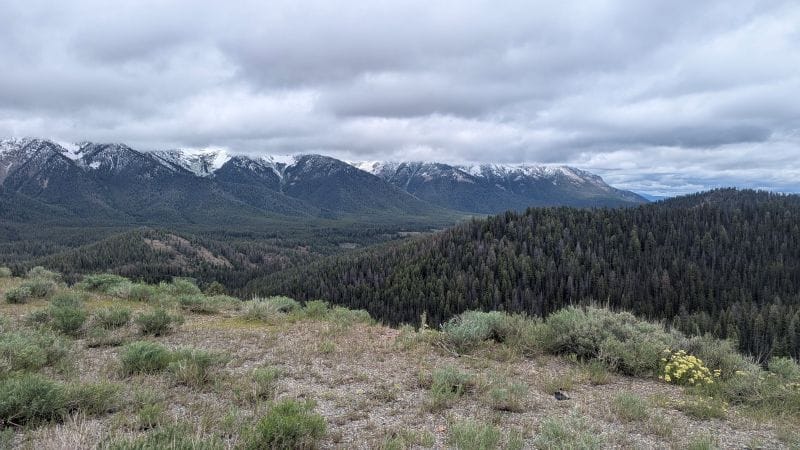Winter started at the end of June. 6 We were starting to scout for our next campsite the day after winter started. The snow line isn't very high above our camping site.