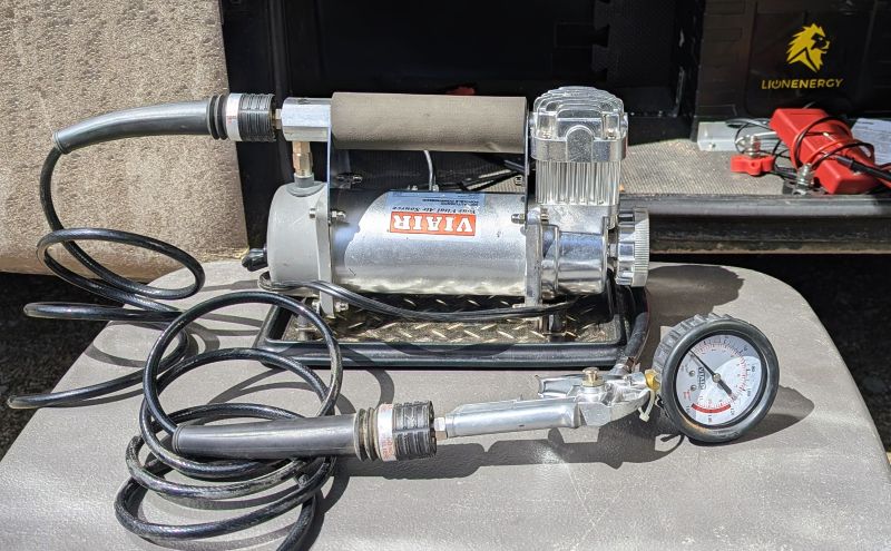 Instead of waiting for our RV air pressure to fully inflate the captured air tank we use our VIAIR 400 Automatic portable air compressor is to inflate both RV and car tires.