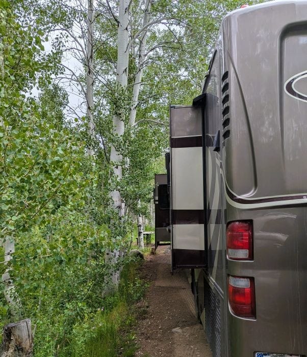 Winter started at the end of June. 4 You can see the wetness in the ground under our RV after winter started. You can also see the trees on this side were very close this is after I trimmed them.