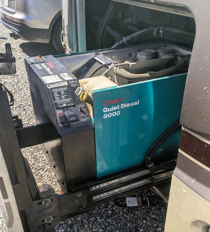 Then our generator failed. 23 My generator (driver side) extended as far as it will go at the front of my RV.