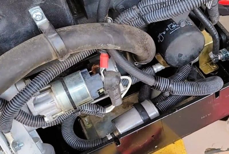 Then our generator failed. 17 View of my generator from the drivers side looking down at the starter and fuel filter.
